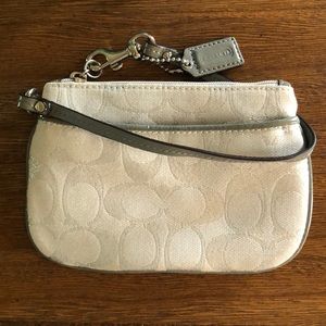 Silver authentic Coach wristlet